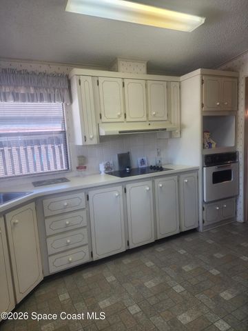 1334 Barefoot Circle N, Barefoot Bay, FL 32976