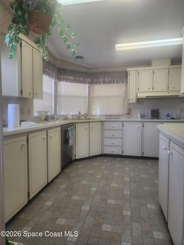 1334 Barefoot Circle N, Barefoot Bay, FL 32976