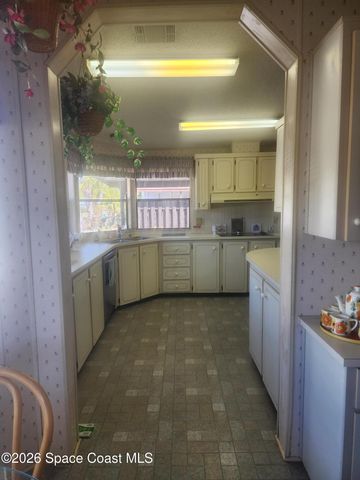 1334 Barefoot Circle N, Barefoot Bay, FL 32976