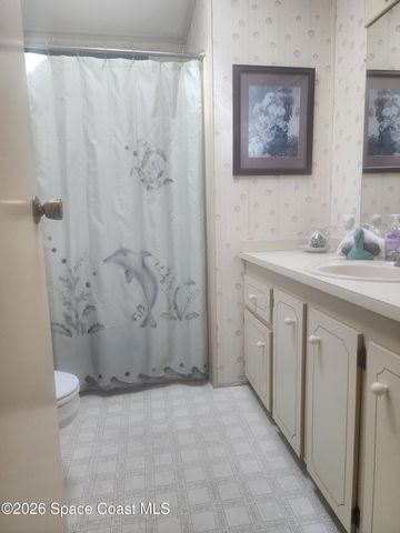 1334 Barefoot Circle N, Barefoot Bay, FL 32976