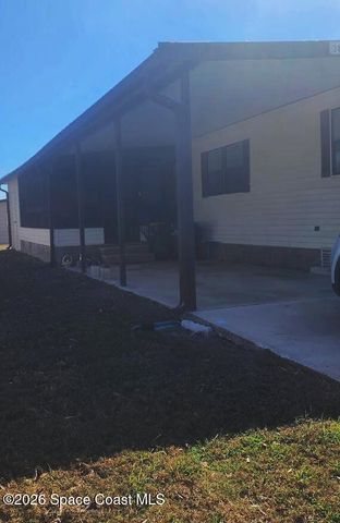 1334 Barefoot Circle N, Barefoot Bay, FL 32976