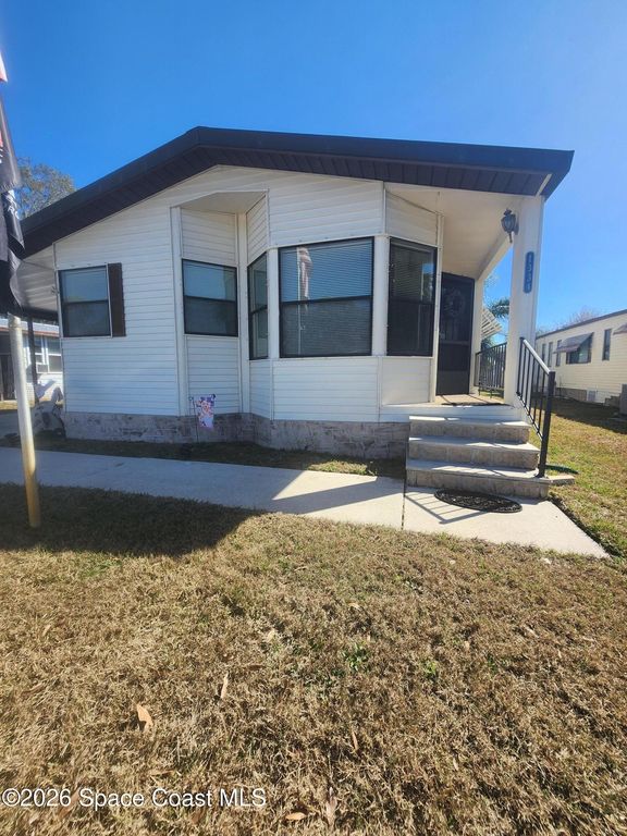 1334 Barefoot Circle N, Barefoot Bay, FL 32976