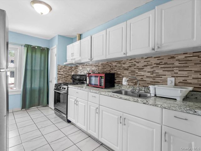 72 Pleasant Avenue, Roosevelt, NY 11575