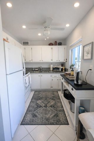 100 E Kingswood E, West Palm Beach, FL 33417