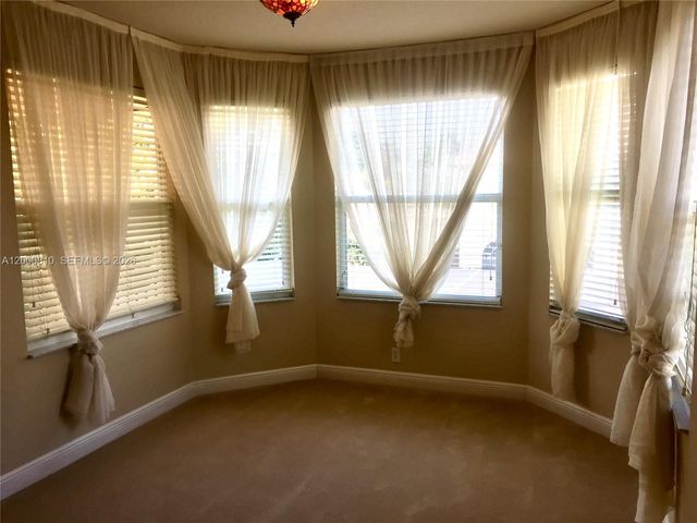 7477 NW 114th Ter 7477, Parkland, FL 33076