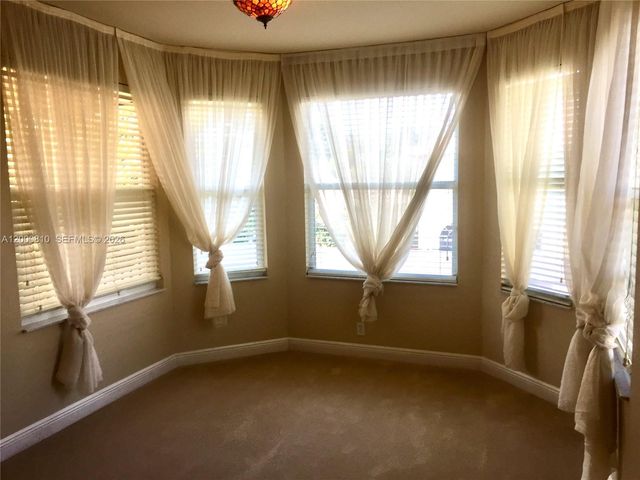 7477 NW 114th Ter 7477, Parkland, FL 33076