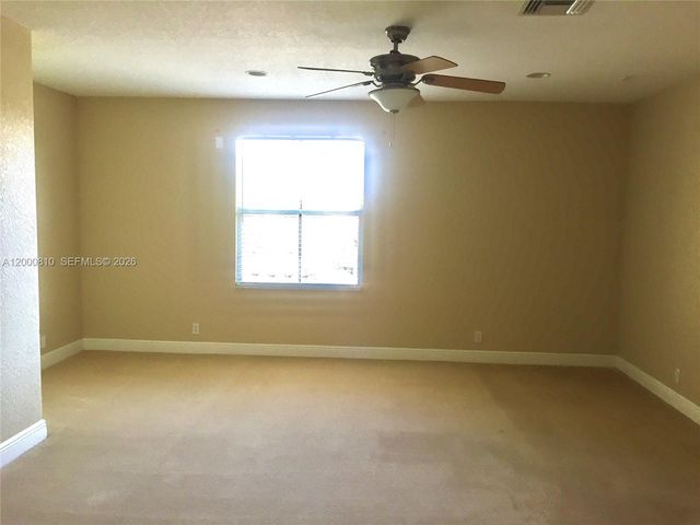 7477 NW 114th Ter 7477, Parkland, FL 33076