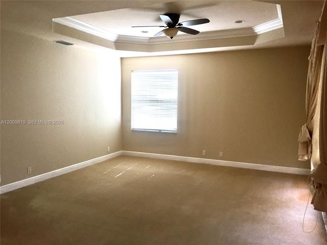 7477 NW 114th Ter 7477, Parkland, FL 33076