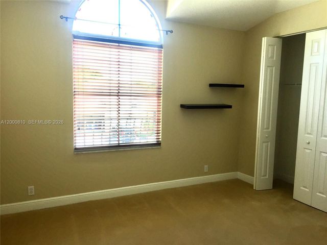 7477 NW 114th Ter 7477, Parkland, FL 33076