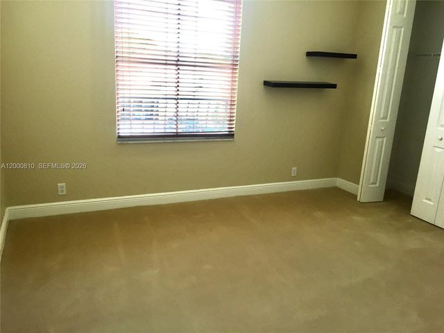 7477 NW 114th Ter 7477, Parkland, FL 33076