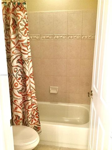 7477 NW 114th Ter 7477, Parkland, FL 33076