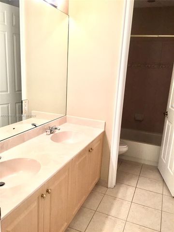 7477 NW 114th Ter 7477, Parkland, FL 33076