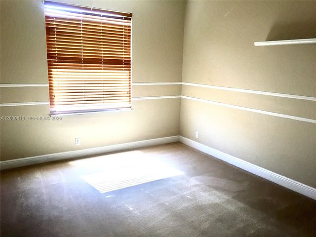 7477 NW 114th Ter 7477, Parkland, FL 33076