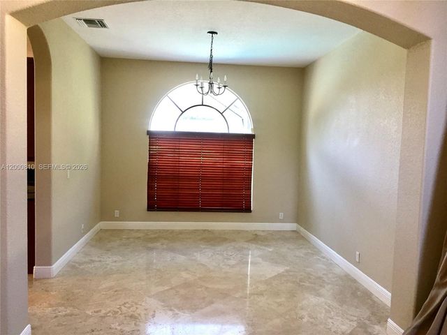 7477 NW 114th Ter 7477, Parkland, FL 33076