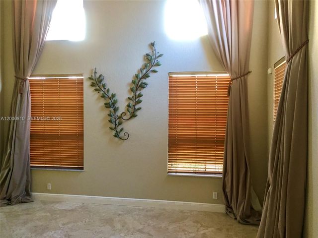 7477 NW 114th Ter 7477, Parkland, FL 33076