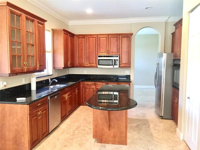 7477 NW 114th Ter 7477, Parkland, FL 33076