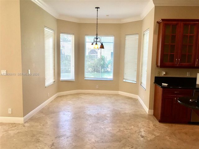 7477 NW 114th Ter 7477, Parkland, FL 33076