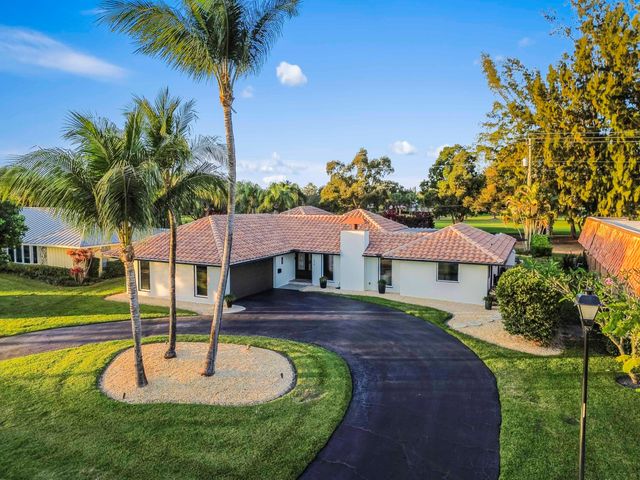 220 Walton Heath Drive, Atlantis, FL 33462