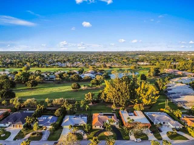 220 Walton Heath Drive, Atlantis, FL 33462