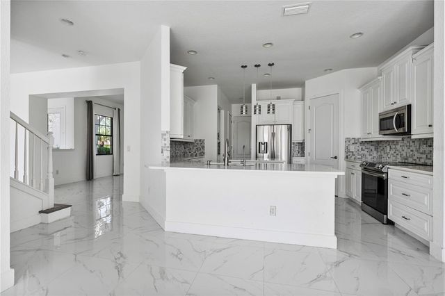 13019 WOODFORD STREET, Orlando, FL 32832