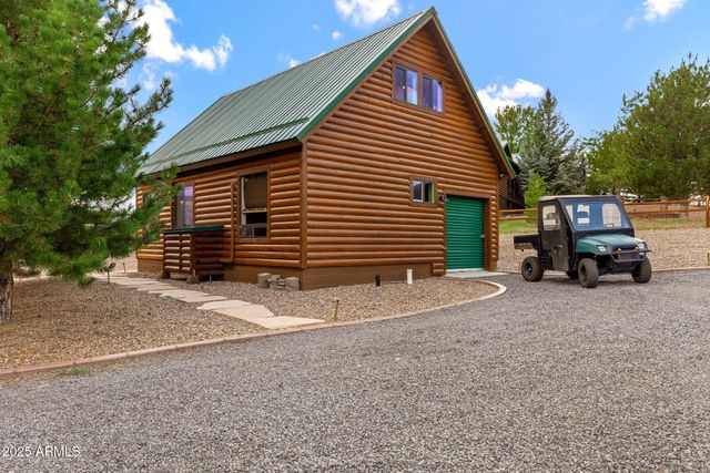 2702 COVERED WAGON Trail, Overgaard, AZ 85933