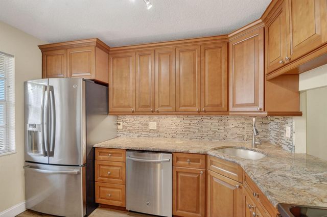 112 Lake Olive Drive, Royal Palm Beach, FL 33411