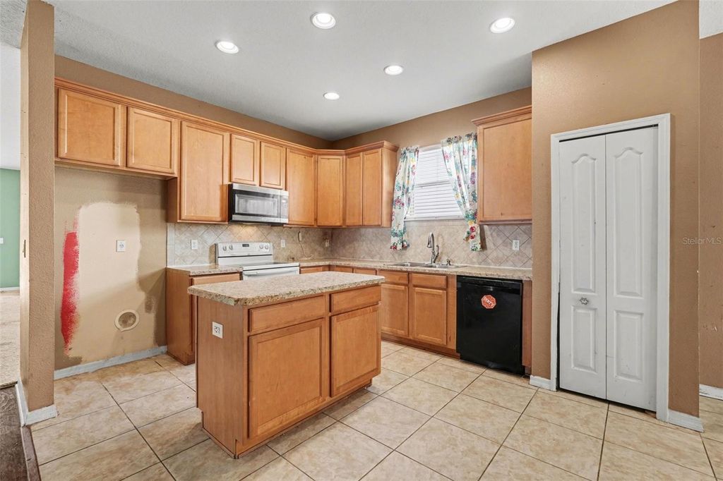 Image 13 of property listing at 11941 PALM BAY COURT, New Port Richey, FL 34654