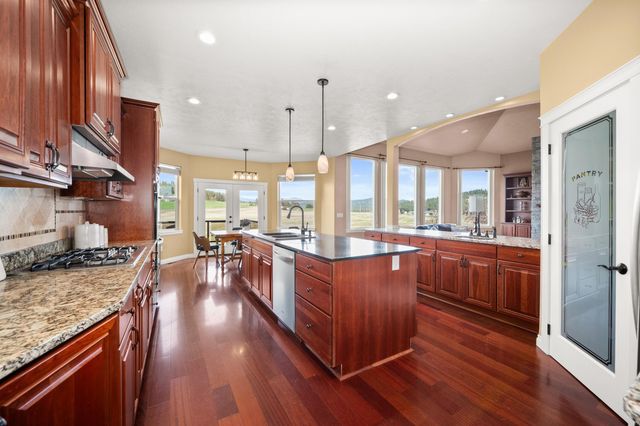 10311 E Peone Landing Ln, Mead, WA 99021