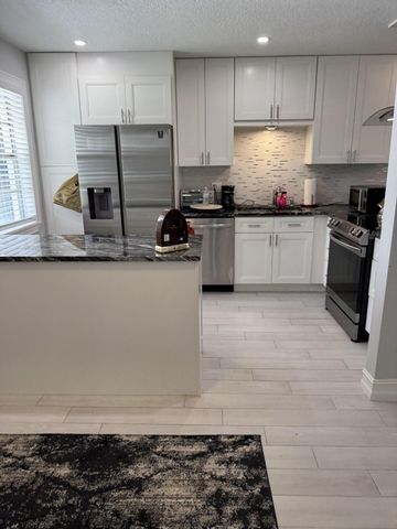 133 Lake Olive Drive, West Palm Beach, FL 33411