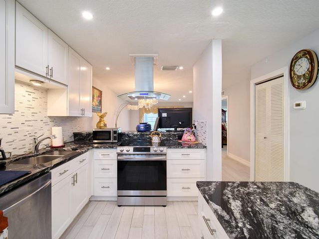 133 Lake Olive Drive, West Palm Beach, FL 33411