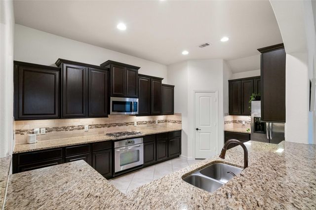 99 W Jagged Ridge Circle, Spring, TX 77389