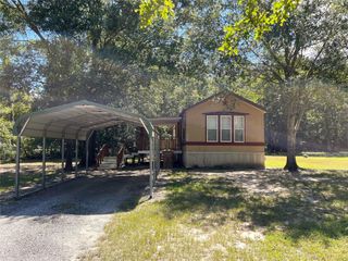 286 Fm 1696 Road W J, Huntsville, TX 77320