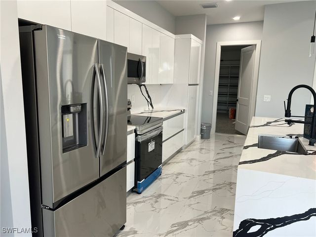 813 Aiken AVE, Lehigh Acres, FL 33974