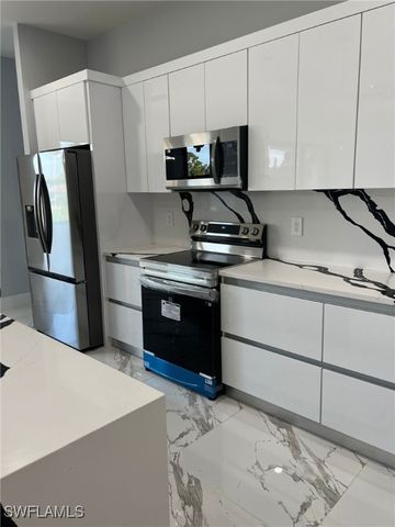 813 Aiken AVE, Lehigh Acres, FL 33974