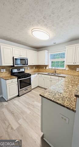326 Canterbury Place Drive, Suwanee, GA 30024