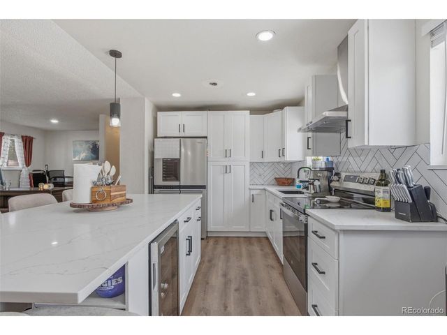 12962 Olmsted Pl, Denver, CO 80239