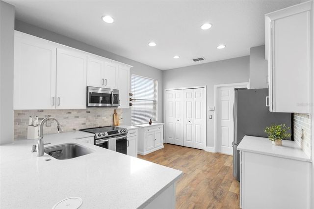 9967 HERON POINTE DRIVE, Orlando, FL 32832