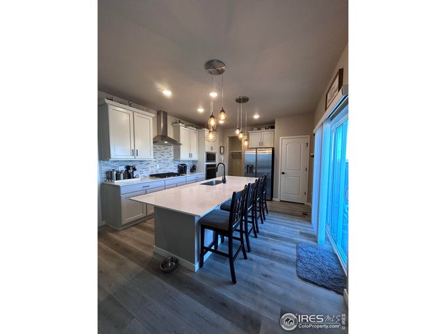 1202 Coyote Ln, Wiggins, CO 80654