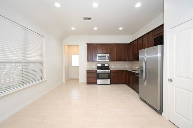 9415 Savannah Holly Drive, Houston, TX 77075