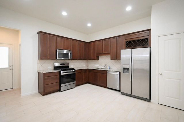 9415 Savannah Holly Drive, Houston, TX 77075