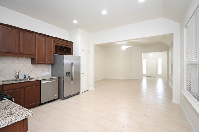 9415 Savannah Holly Drive, Houston, TX 77075