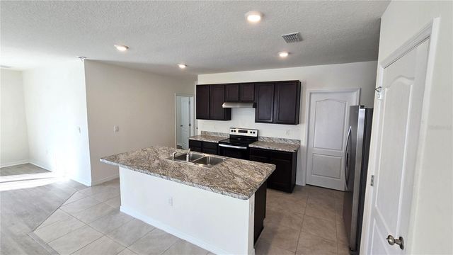 1671 ROSY DALE CIRCLE, Davenport, FL 33837