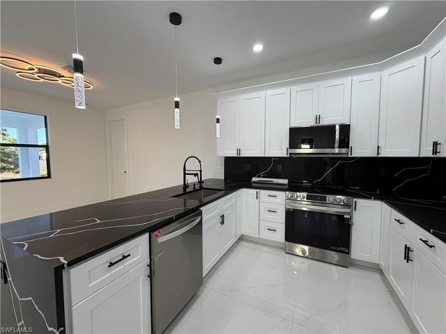 2906 29th ST SW, Lehigh Acres, FL 33976