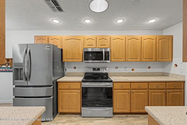 7406 heather walk Drive, Spring Hill, FL 34613