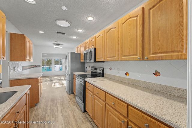 7406 heather walk Drive, Spring Hill, FL 34613