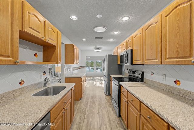 7406 heather walk Drive, Spring Hill, FL 34613