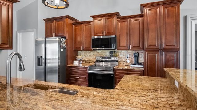 8925 PEBBLE BEACH PLACE, Clermont, FL 34711