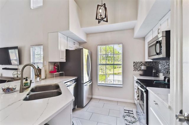 9064 LAKE CHASE ISLAND WAY, Tampa, FL 33626