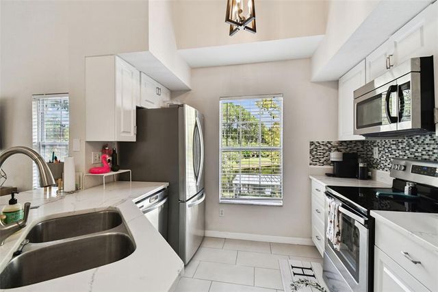 9064 LAKE CHASE ISLAND WAY, Tampa, FL 33626