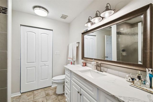 9064 LAKE CHASE ISLAND WAY, Tampa, FL 33626